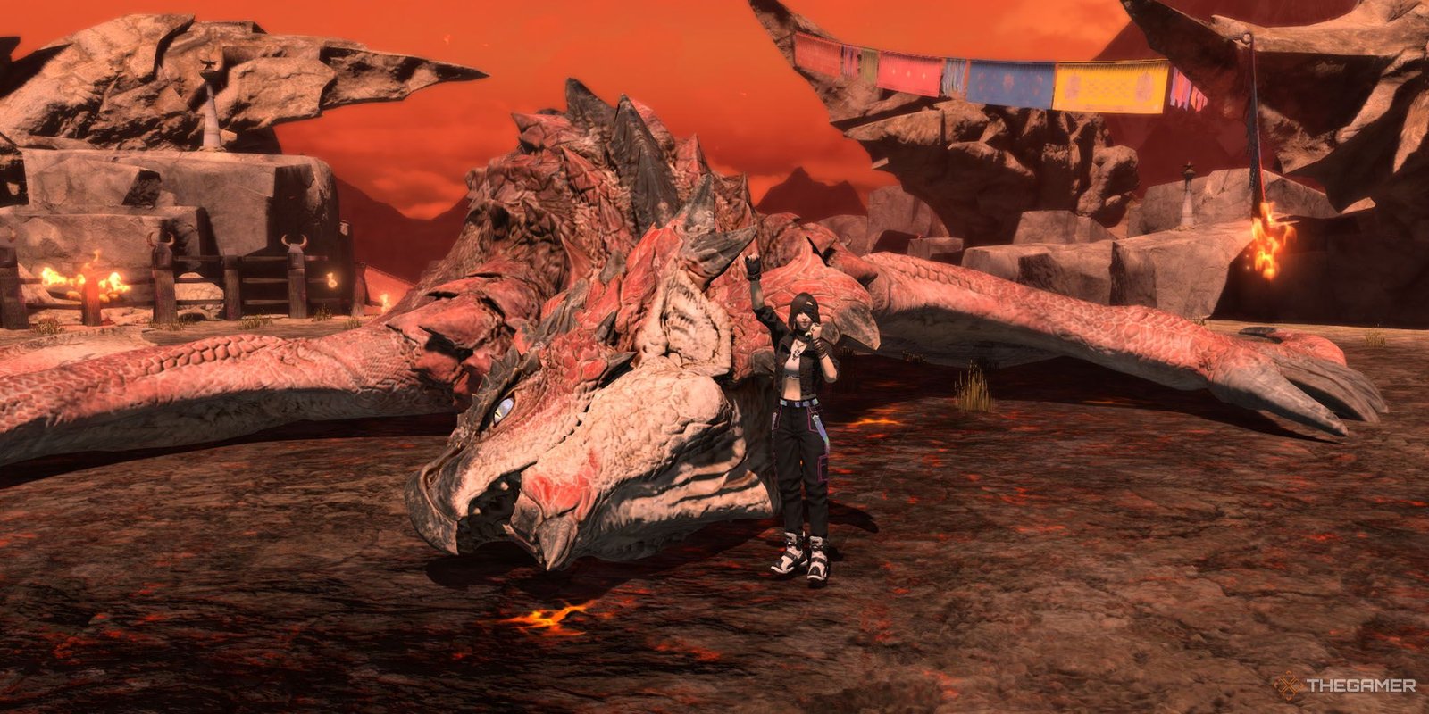 A player beside a defeated Rathalos in Final Fantasy 14.